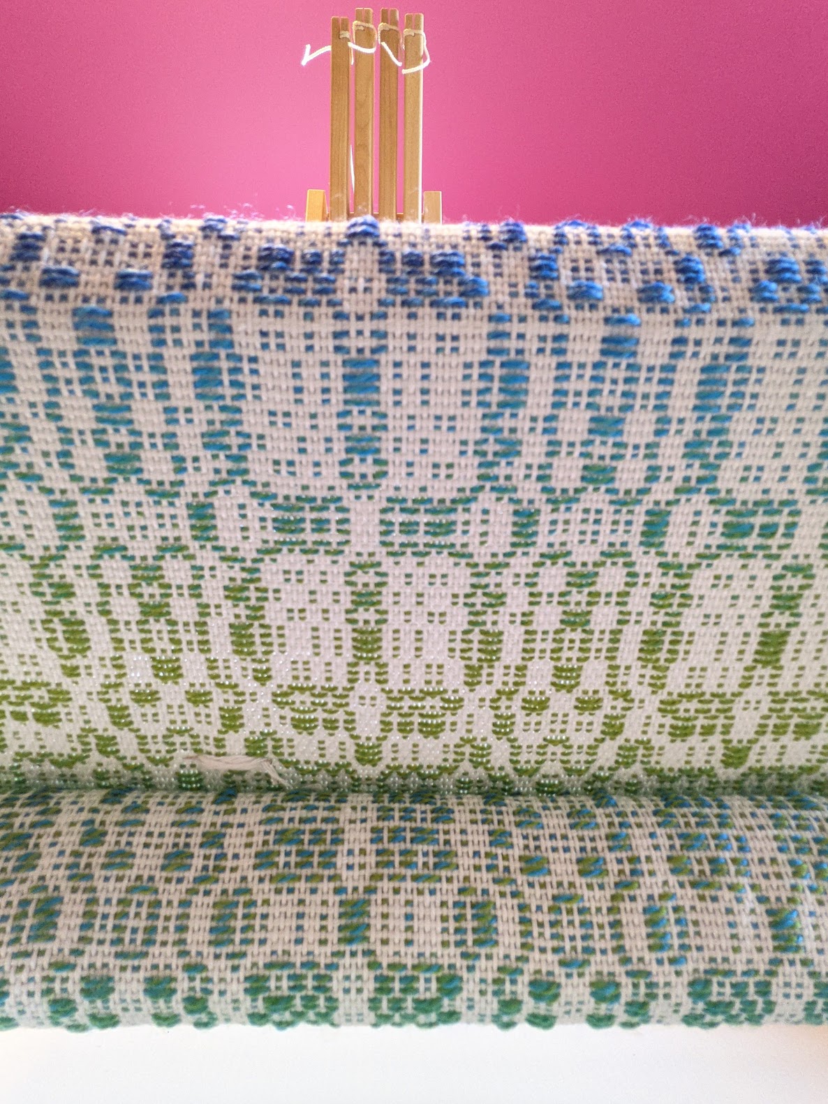 teal pattern on white weave